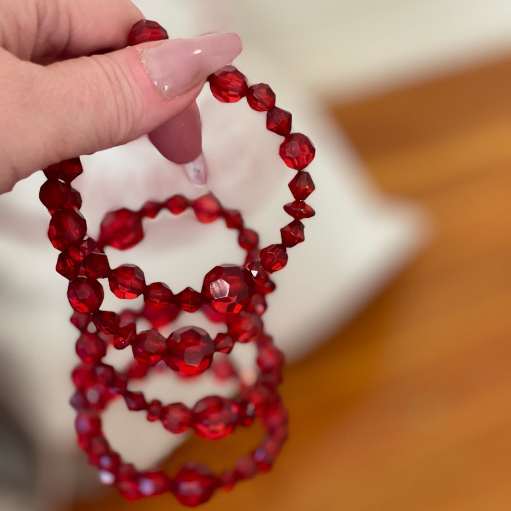 Gorgeous dangling adjustable red bracelet. Perfect for a Christmas evening